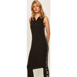 Dkny - Sukienka. Czarne sukienki damskie DKNY, na co dzień, s, z aplikacjami, z elastanu, casualowe, bez kołnierzyka, z krótkim rękawem, krótkie, mini, proste. Za 349,90 zł.