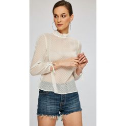 Tommy Jeans - Bluzka. Białe bluzki damskie Tommy Jeans, na co dzień, s, bez wzorów, z poliesteru, casualowe, ze stójką, bez rękawów. W wyprzedaży za 219,90 zł.
