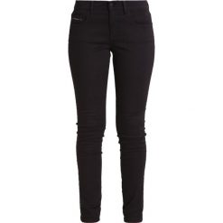 Calvin Klein Jeans MID RISE SKINNY Jeans Skinny Fit black. Czarne jeansy damskie relaxed fit Calvin Klein Jeans, z bawełny. W wyprzedaży za 377,30 zł.