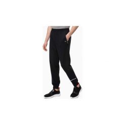 Spodnie treningowe Calvin Klein Jeans 00GMF8P614 WOVEN PANT. Czarne spodnie męskie Calvin Klein Jeans, s, bez wzorów, z jeansu. Za 313,45 zł.
