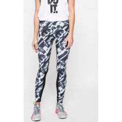 Nike - Legginsy. Niebieskie rurki damskie Nike, s, z elastanu. W wyprzedaży za 139,90 zł.