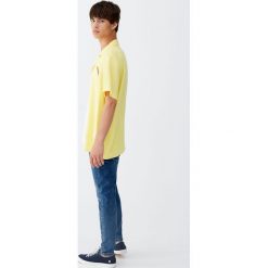 Ciemnoniebieskie jeansy carrot fit. Szare jeansy męskie marki Pull&Bear, m, bez wzorów. Za 109,00 zł.