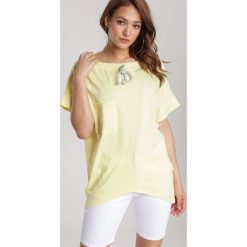 Żółta Bluzka Rhenephine. Żółte bluzki damskie Renee, xl, bez wzorów, bez kołnierzyka, bez rękawów. Za 59,99 zł.