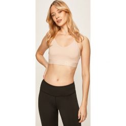 Reebok - Biustonosz sportowy. Biustonosze sportowe damskie Reebok, s, bez wzorów, z elastanu. Za 79,90 zł.