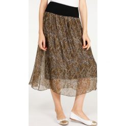 Spódnica z jedwabiem - 116-9917C NERO. Czarne spódniczki damskie Unisono, na co dzień, na jesień, s, bez wzorów, z elastanu, midi, proste. Za 139,00 zł.