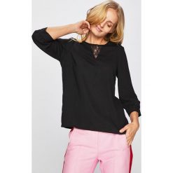 Vero Moda - Bluzka. Czarne bluzki damskie Vero Moda, s, bez wzorów, z elastanu, eleganckie, z okrągłym kołnierzem, bez rękawów. W wyprzedaży za 59,90 zł.