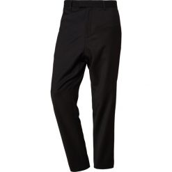 Filippa K NOAH SLACKS Spodnie materiałowe black. Czarne spodnie męskie marki Filippa K, m, bez wzorów, z elastanu. Za 839,00 zł.