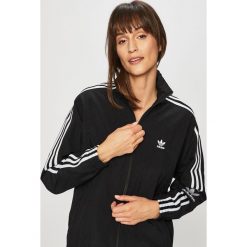 Adidas Originals - Kurtka. Czarne kurtki damskie adidas Originals, bez wzorów, z poliesteru, krótkie, bez kaptura. W wyprzedaży za 199,90 zł.