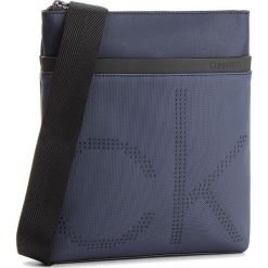 Saszetka CALVIN KLEIN - Ck Poit Flat Crosso K50K503877 443. Niebieskie torby męskie skórzane Calvin Klein, bez wzorów, z materiału, młodzieżowe. W wyprzedaży za 279,00 zł.