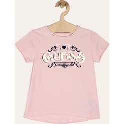 Guess Jeans - T-shirt dziecięcy 118-175 cm. Białe bluzki dziewczęce Guess Jeans, z nadrukiem, z elastanu, z okrągłym kołnierzem, z krótkim rękawem, krótkie, bez kaptura. W wyprzedaży za 69,90 zł.