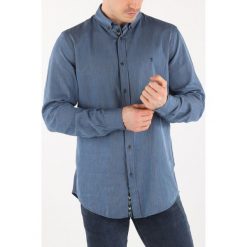 Trussardi Jeans Koszula Niebieski. Niebieskie koszule męskie Trussardi Jeans, bez wzorów, z bawełny, bez kołnierzyka, z długim rękawem. Za 490,95 zł.