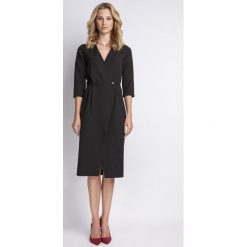 Czarna Elegancka Sukienka Midi z Kopertowym Dekoltem. Czarne sukienki damskie koktajlowe marki Molly.pl, na co dzień, s, z kopertowym dekoltem, midi, kopertowe. Za 154,90 zł.