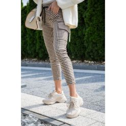 Spodnie Krata Beż. Spodnie damskie Modaforyou, s, bez wzorów, z elastanu. Za 89,00 zł.