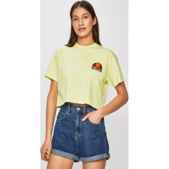 Ellesse - Top. Żółte bluzki damskie Ellesse, s, z nadrukiem, z bawełny, z okrągłym kołnierzem. W wyprzedaży za 79,90 zł.