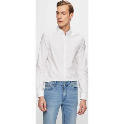 Armani Exchange - Koszula. Białe koszule męskie Armani Exchange, m, bez wzorów, z bawełny, eleganckie, z klasycznym kołnierzykiem, z długim rękawem. W wyprzedaży za 219,90 zł.