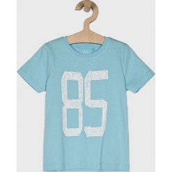 Name it - T-shirt dziecięcy 92-128 cm. Żółte t-shirty chłopięce Name it, z nadrukiem, z bawełny, bez rękawów. W wyprzedaży za 24,90 zł.