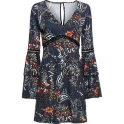 Sukienka shirtowa wzorzysta bonprix brązowo-pomarańczowo-czarny. Pomarańczowe sukienki damskie bonprix, bez wzorów, bez kołnierzyka, bez rękawów. Za 79,99 zł.