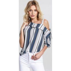 Niebieska Bluzka Blue Eyes. Niebieskie bluzki damskie marki other, s, bez wzorów, bez kołnierzyka, z krótkim rękawem. Za 39,99 zł.