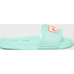 Melissa - Klapki x Fila. Zielone klapki damskie Melissa, bez wzorów, z gumy, bez obcasa, na obcasie. W wyprzedaży za 259,90 zł.