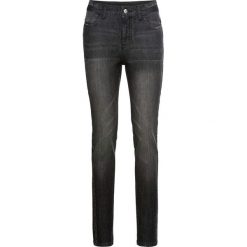 Dżinsy ze stretchem, z mieniącymi się kamieniami bonprix czarny "used". Czarne jeansy damskie bonprix, z jeansu. Za 149,99 zł.