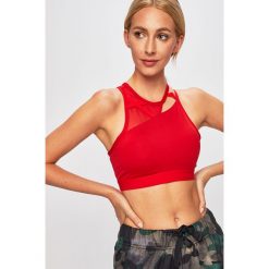 Nike - Biustonosz sportowy. Czerwone biustonosze sportowe damskie Nike, l, bez wzorów, z elastanu, dri-fit (nike). W wyprzedaży za 119,90 zł.