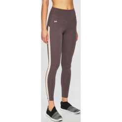Under Armour - Legginsy. Fioletowe spodnie damskie Under Armour, s, z elastanu. W wyprzedaży za 119,90 zł.