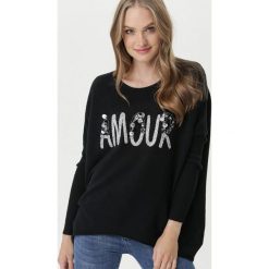 Czarny Sweter Malabar. Czarne swetry damskie Born2be, xl, z aplikacjami, klasyczne, z długim rękawem, długie, bez kaptura. Za 119,99 zł.