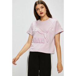 Puma - Top. Różowe bluzki damskie Puma, s, z nadrukiem, z elastanu, casualowe, z okrągłym kołnierzem, z krótkim rękawem. W wyprzedaży za 79,90 zł.