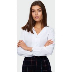 Bluzka z kołnierzem. Bluzki damskie Greenpoint, bez wzorów, z poliesteru, bez kołnierzyka, bez rękawów. Za 59,99 zł.