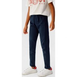 Mango Kids - Legginsy dziecięce Praga 110-164 cm. Różowe spodnie dziewczęce Mango Kids, bez wzorów, z bawełny, casualowe. Za 45,90 zł.