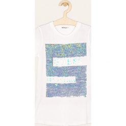 Guess Jeans - T-shirt dziecięcy 118-175 cm. Białe bluzki dziewczęce Guess Jeans, z aplikacjami, z bawełny, z okrągłym kołnierzem, z krótkim rękawem, krótkie, bez kaptura. Za 139,90 zł.