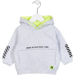 Bluza w kolorze białym. Białe bluzy niemowlęce Losan, z nadrukiem, z bawełny, bez rękawów, bez kaptura. W wyprzedaży za 34,95 zł.
