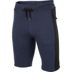 Spodenki dresowe męskie SKMD205 - granatowy ciemny. Niebieskie spodenki sportowe męskie marki 4f, na lato, m, bez wzorów, z bawełny, na fitness i siłownię. W wyprzedaży za 39,99 zł.