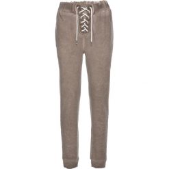 Spodnie dresowe damskie: Spodnie dresowe bonprix brunatny „used”
