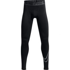 Chinosy chłopięce: Nike Spodnie juniorskie B NP Tight Comp HBR czarne r. XS (128 cm) (726464)