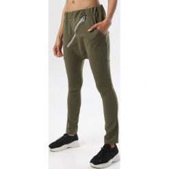 Khaki Spodnie Adrealin. Brązowe spodnie damskie Born2be, xl, z dresówki. W wyprzedaży za 69,99 zł.