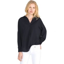 French Connection Bluzka Niebieski. Niebieskie bluzki damskie French Connection, l, bez wzorów, z poliesteru, bez kołnierzyka, bez rękawów. Za 330,95 zł.