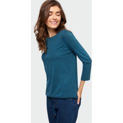 Top z geometrycznym nadrukiem. Bluzki damskie Greenpoint, z nadrukiem, z elastanu, bez kołnierzyka. Za 39,99 zł.