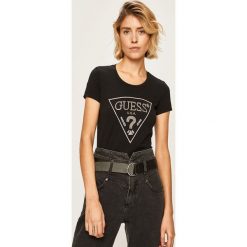 Guess Jeans - T-shirt. Białe bluzki damskie Guess Jeans, s, z aplikacjami, z elastanu, z okrągłym kołnierzem. W wyprzedaży za 159,90 zł.