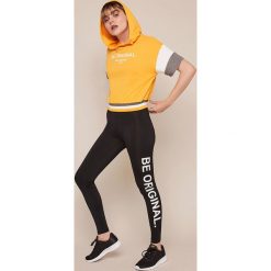 Undiz - Legginsy Basicsportiz. Czarne legginsy damskie Undiz, s, z nadrukiem, z elastanu. W wyprzedaży za 49,90 zł.