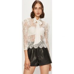 Morgan - Bluzka. Białe bluzki damskie Morgan, s, bez wzorów, z bawełny, eleganckie, bez kołnierzyka, z długim rękawem. Za 199,90 zł.