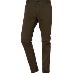 Tiger of Sweden Spodnie materiałowe olive. Zielone spodnie męskie marki Tiger of Sweden, m, bez wzorów, z elastanu. Za 549,00 zł.