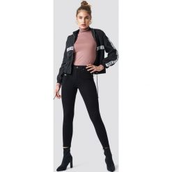 Spodnie damskie: Trendyol Jeansy skinny z wysokim stanem - Black