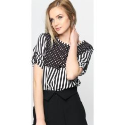 Czarna Bluzka On Me. Czarne bluzki damskie na imprezę marki Born2be, s. Za 64,99 zł.