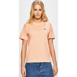 Fila - Top. Pomarańczowe bluzki damskie Fila, s, bez wzorów, z bawełny, z okrągłym kołnierzem. W wyprzedaży za 89,90 zł.