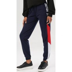 Granatowo-Czerwone Spodnie Elinnaya. Niebieskie spodnie damskie Born2be, s, z dresówki. Za 79,99 zł.