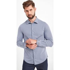 KOSZULA Emporio Armani. Koszule męskie Emporio Armani, s, bez wzorów, eleganckie, bez kołnierzyka, bez rękawów. Za 939,00 zł.