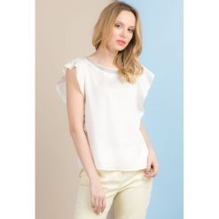 Bluzka z biżuteryjną lamówką. Bluzki damskie Monnari, z aplikacjami, eleganckie. Za 89,50 zł.