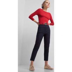 Spodnie skinny z paskiem. Niebieskie rurki damskie Orsay, z elastanu. W wyprzedaży za 85,00 zł.