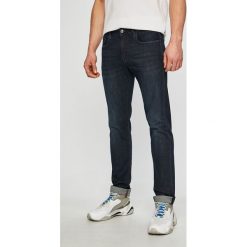 Armani Exchange - Jeansy. Niebieskie jeansy męskie marki Armani Exchange, z aplikacjami. Za 449,90 zł.